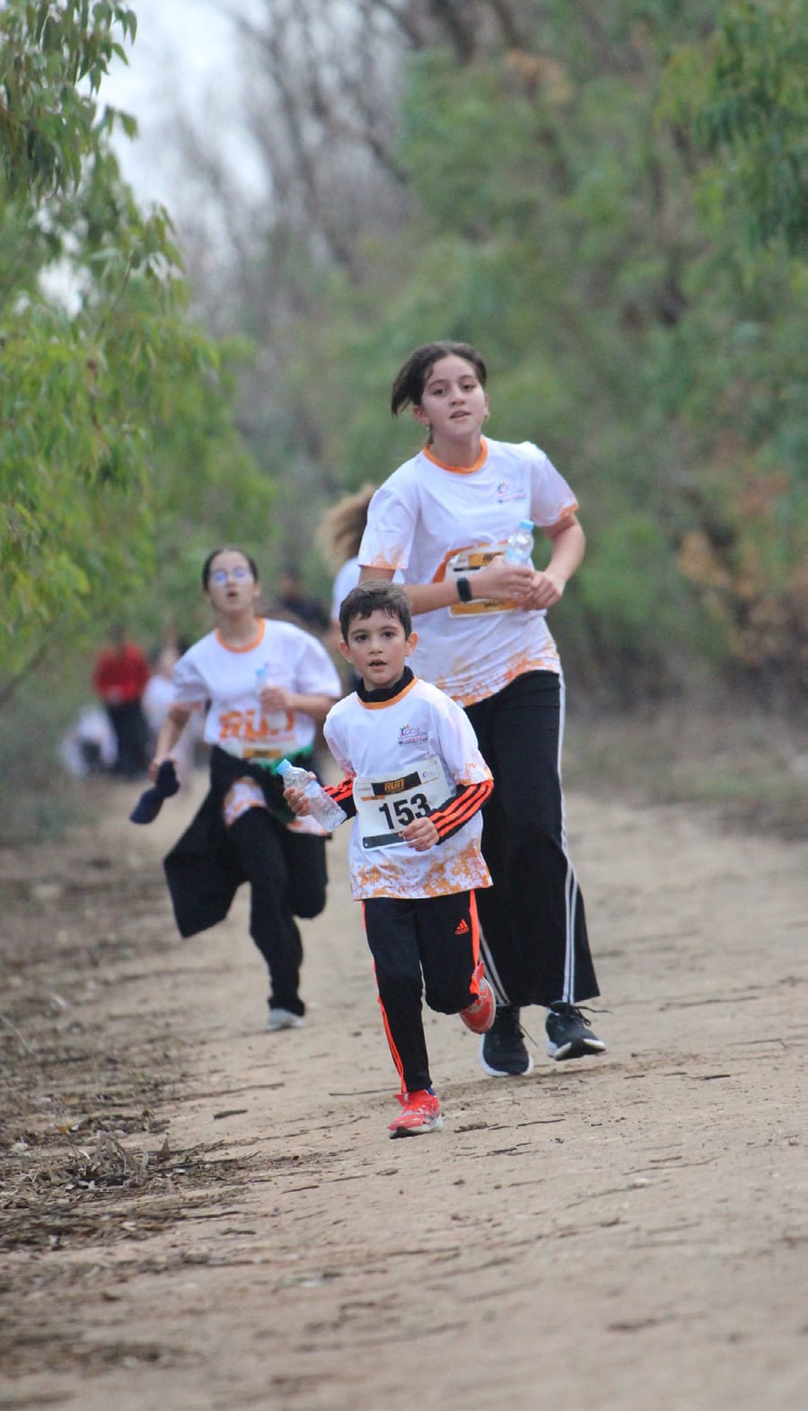 A mother and her child running together